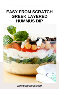 Easy From Scratch Greek Layered Hummus Dip in glass bowl