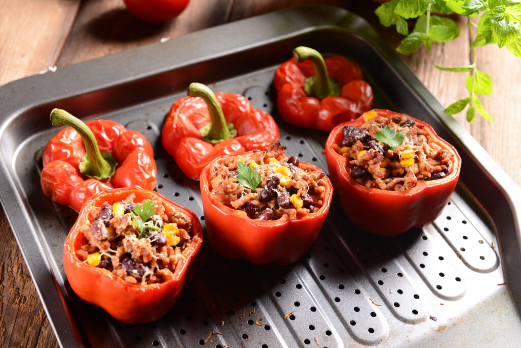 Stuffed peppers with ground turkey meat, kidney beans and corn