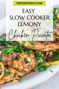 Easy Slow Cooker Lemony Chicken Piccata on white platter with sliced lemons