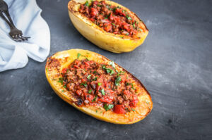 Stuffed Spaghetti squash with ground turkey breast, mozzarella cheese, tomatoes and seasoning. Topped with parsley