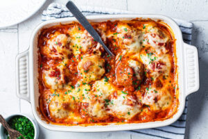 healthy baked cheesy meatball casserole high protein dinner easy comfort food recipe with tomato sauce