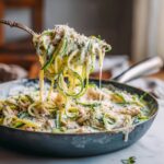 Rotisserie chicken cottage cheese Alfredo zoodle skillet with zucchini noodles, shredded rotisserie chicken and creamy Alfredo sauce